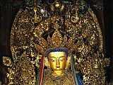 Tibet Lhasa 04 11 Potala Maitreya The giant 3.7m-high seated Maitreya (Jampa) is a finely crafted gilt-copper statue commissioned by the Eighth Dalai Lama.